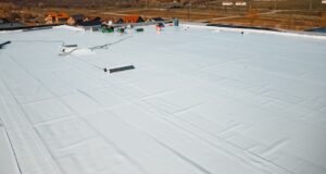 low slope commercial roofing options, pros and cons of low slow commercial roof