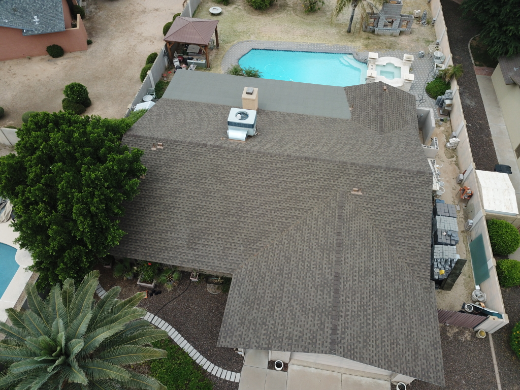 a house with a pool in the back