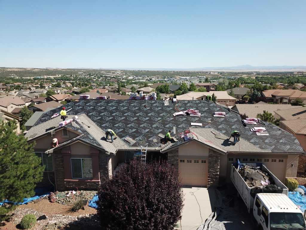 a roofing company on a house
