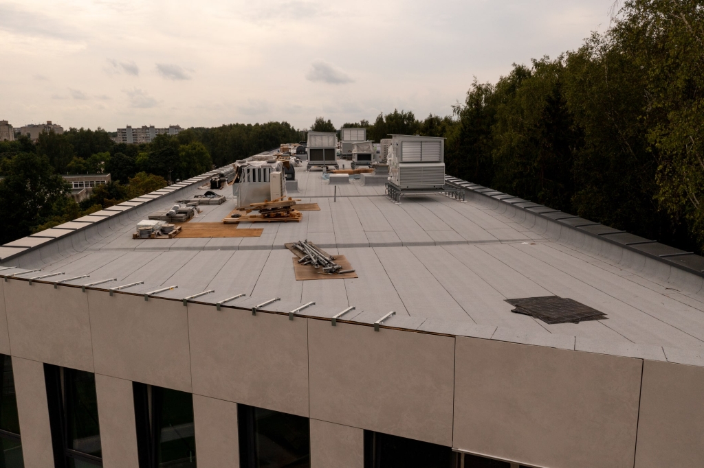 a roof of a building with many equipment